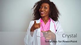  Presentation with american energy - Theme enhanced with african american doctor woman wearing pink stethoscope over isolated white background pointing fingers to camera with happy and funny face good energy and vibes background and a light gray colored foreground
