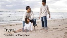  Presentation with african american children - Cool new PPT theme with african-american father and two children playing together on beach backdrop and a soft green colored foreground