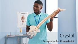  Presentation with spinal - Theme enhanced with african-american-man-holding-anatomical background and a light blue colored foreground