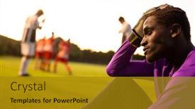  Presentation with soccer field - PPT theme enhanced with african-american-stressed-male-goalkeeper background and a gold colored foreground
