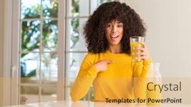  Presentation with healthy juice - Slide deck consisting of african american woman drinking healthy fruit juice at home with surprise face pointing finger to himself background and a yellow colored foreground