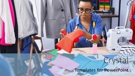  Presentation with african cloth - Theme having african-american-woman-tailor-holding background and a light blue colored foreground