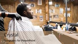  Presentation with african tribes - PPT layouts consisting of african guy sitting in barbershop background and a coral colored foreground