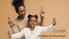  Presentation with good luck - Audience pleasing PPT theme consisting of african-mother-and-daughter-holding backdrop and a coral colored foreground