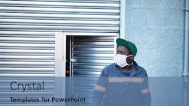  Presentation with mask - Amazing PPT theme having african-worker-wearing-a-mask backdrop and a teal colored foreground