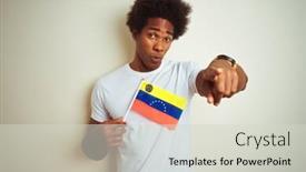  Presentation with venezuela - Slide set consisting of afro american man holding venezuela venezuelan flag standing over isolated white background pointing with finger to the camera and to you hand sign positive and confident gesture from the front background and a soft green colored foreground