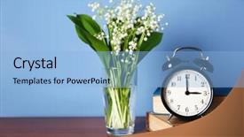  Presentation with lily - Presentation theme featuring alarm clock with lily bouquet on table background and a light blue colored foreground