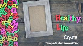  Presentation with healthy - Colorful theme enhanced with alphabet border - healthy life word on wooden backdrop and a gray colored foreground