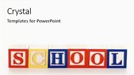  Presentation with school building - Theme enhanced with alphabet toy building blocks spelling the word school background and a white colored foreground