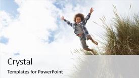  Presentation with child jumping to tree - Beautiful slides featuring american explorers - boy jumping over dune backdrop and a sky blue colored foreground