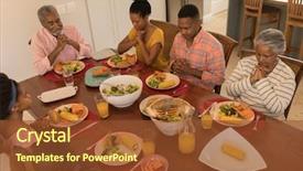  Presentation with dining table - PPT layouts having american multi-generation family praying background and a tawny brown colored foreground