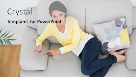  Presentation with bright yellow - Slide deck having amused casual brunette in yellow cardigan using a tablet pc lying on a couch in bright living room background and a white colored foreground