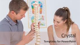  Presentation with doctor office - Presentation having anatomy - doctor showing anatomical spine background and a coral colored foreground