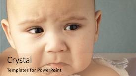  Presentation with angry baby - Cool new theme with angry baby on a blue backdrop and a coral colored foreground