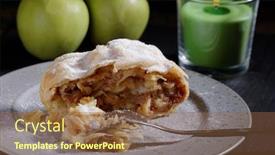  Presentation with powdered - Presentation theme having apple strudel with powdered sugar fresh apples and candle background and a tawny brown colored foreground