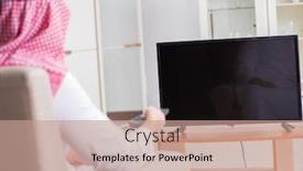  Presentation with arab countries - Audience pleasing slide deck consisting of arab-businessman-watching-tv backdrop and a coral colored foreground