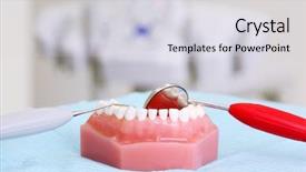  Presentation with artificial teeth - PPT layouts with are on table in dental background and a light gray colored foreground