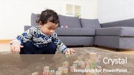  Presentation with baby toy - PPT theme enhanced with asia baby boy concentrate on playing toy block background and a coral colored foreground