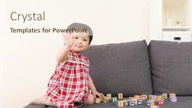  Presentation with baby toy - Presentation theme with asia baby girl play toy block and sitting on sofa background and a cream colored foreground