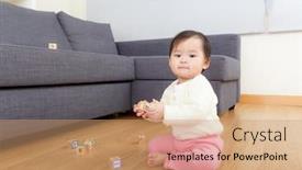  Presentation with baby toy - Beautiful slide deck featuring asia baby girl play toy block at home backdrop and a coral colored foreground