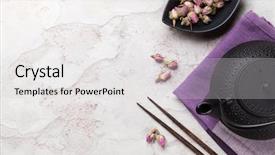  Presentation with top view of candles - Theme having asian rose tea and teapot background and a light gray colored foreground