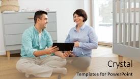  Presentation with nurse meeting a family - PPT theme having assembly - pregnancy family and nursery concept background and a coral colored foreground