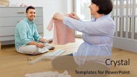  Presentation with baby clothes - Cool new theme with assembly - pregnancy family and nursery concept backdrop and a coral colored foreground
