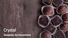  Presentation with chocolate - Presentation theme consisting of assorted chocolate candies on wooden background and a dark gray colored foreground