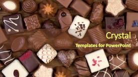  Presentation with chocolate - Amazing slides having assorted chocolate pralines on wooden backdrop and a tawny brown colored foreground
