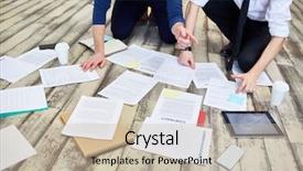  Presentation with two people holding hands - Amazing slide deck having assorted documents and contracts laid backdrop and a  colored foreground