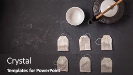  Presentation with black tea - PPT theme with assorted-tea-bags-with-tea background and a dark gray colored foreground