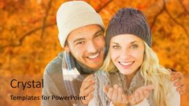  Presentation with winter scene - PPT theme consisting of attractive couple in winter fashion smiling at camera against autumn scene background and a gold colored foreground