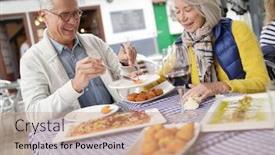  Presentation with tapas - Slide set having attractive senior couple eating tapas outdoors background and a coral colored foreground