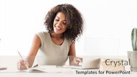  Presentation with young business woman smile show - PPT layouts enhanced with attractive smiling young african woman working with laptop computer and taking notes while sitting at the desk isolated over white background background and a soft green colored foreground