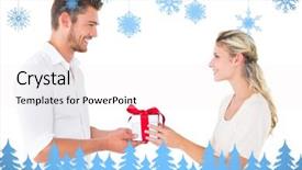  Presentation with snowflakes - PPT theme with attractive young couple holding a gift against snowflakes and fir trees in blue background and a white colored foreground