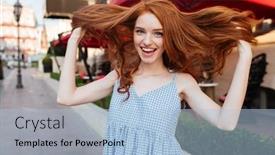  Presentation with city street - Theme consisting of attractive young girl playing with her hair while standing outdoors on a city street and looking at camera background and a light blue colored foreground