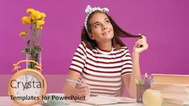  Presentation with taking notes - Amazing PPT theme having attractive young girl sitting at the desk isolated over pink background doing homework taking notes dreaming backdrop and a coral colored foreground