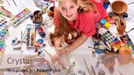  Presentation with exam - Amazing PPT layouts having authentic artist children girl paints with set palette watercolor paints palette and brush in morning sunlight painting in studio on floor reparation for exam in drawing backdrop and a coral colored foreground