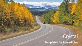  Presentation with road yellow - Colorful PPT theme enhanced with autumn in canada the road abruptly turns among trees with yellow and orange foliage backdrop and a gray colored foreground