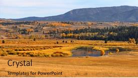  Presentation with natural park yellowstone - PPT theme having autumn landscape near yellowstone background and a gold colored foreground