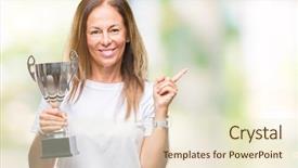  Presentation with trophy award hand holding - Amazing theme having awards show - middle age hispanic winner woman backdrop and a  colored foreground