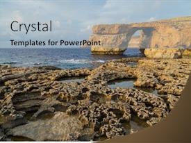 Powerpoint Image Small Rocks Azure Window A Natural Rock PPT template 77 | CrystalGraphics