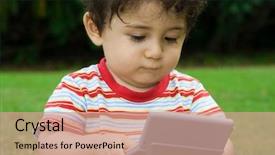  Presentation with laptop - PPT theme consisting of babies genius - toddler boy playing with mini background and a coral colored foreground