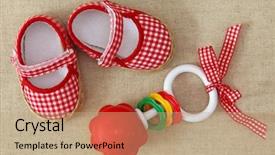  Presentation with baby shoes - Presentation theme enhanced with babies good - baby rattle and red shoes background and a coral colored foreground