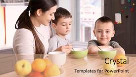  Presentation with nanny - PPT theme having baby alimentation - nanny feeding cute little boys background and a coral colored foreground