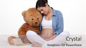  Presentation with pregnant woman - PPT layouts having baby book animals - pregnant woman embracing motherhood background and a soft green colored foreground