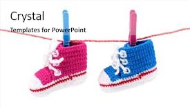  Presentation with pink white - PPT layouts consisting of baby bootees on the clothesline background and a white colored foreground