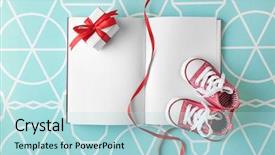  Presentation with notebook - Cool new PPT theme with baby boots and notebook top backdrop and a light blue colored foreground