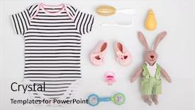  Presentation with baby toy - Amazing slide set having soft toy - baby care accessories and clothing backdrop and a light gray colored foreground
