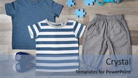  Presentation with baby clothes - Colorful presentation theme enhanced with rattles kids - baby clothes and accessories backdrop and a teal colored foreground